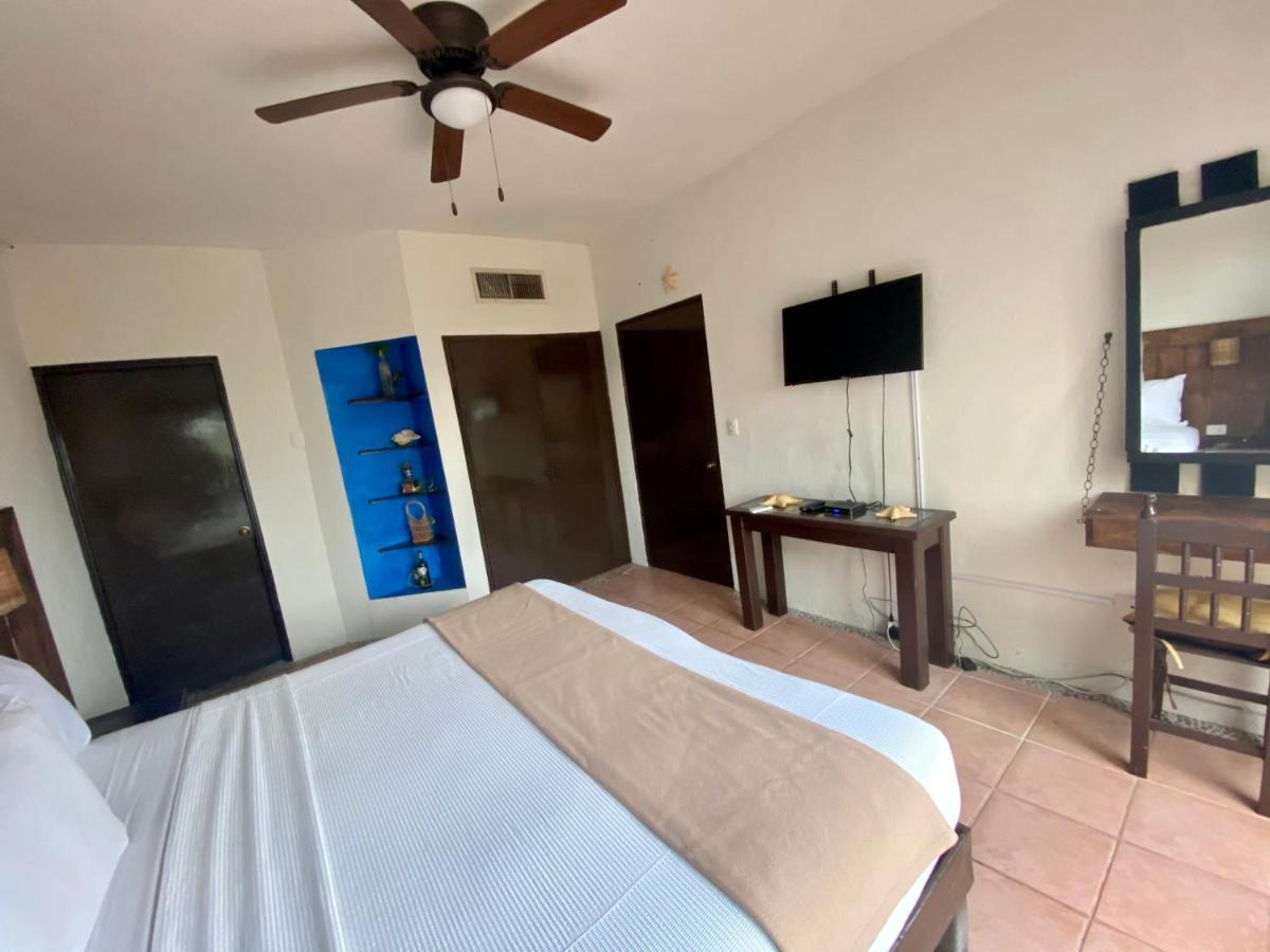 Casa Caribe Канкун Екстериор снимка A bedroom at the hotel