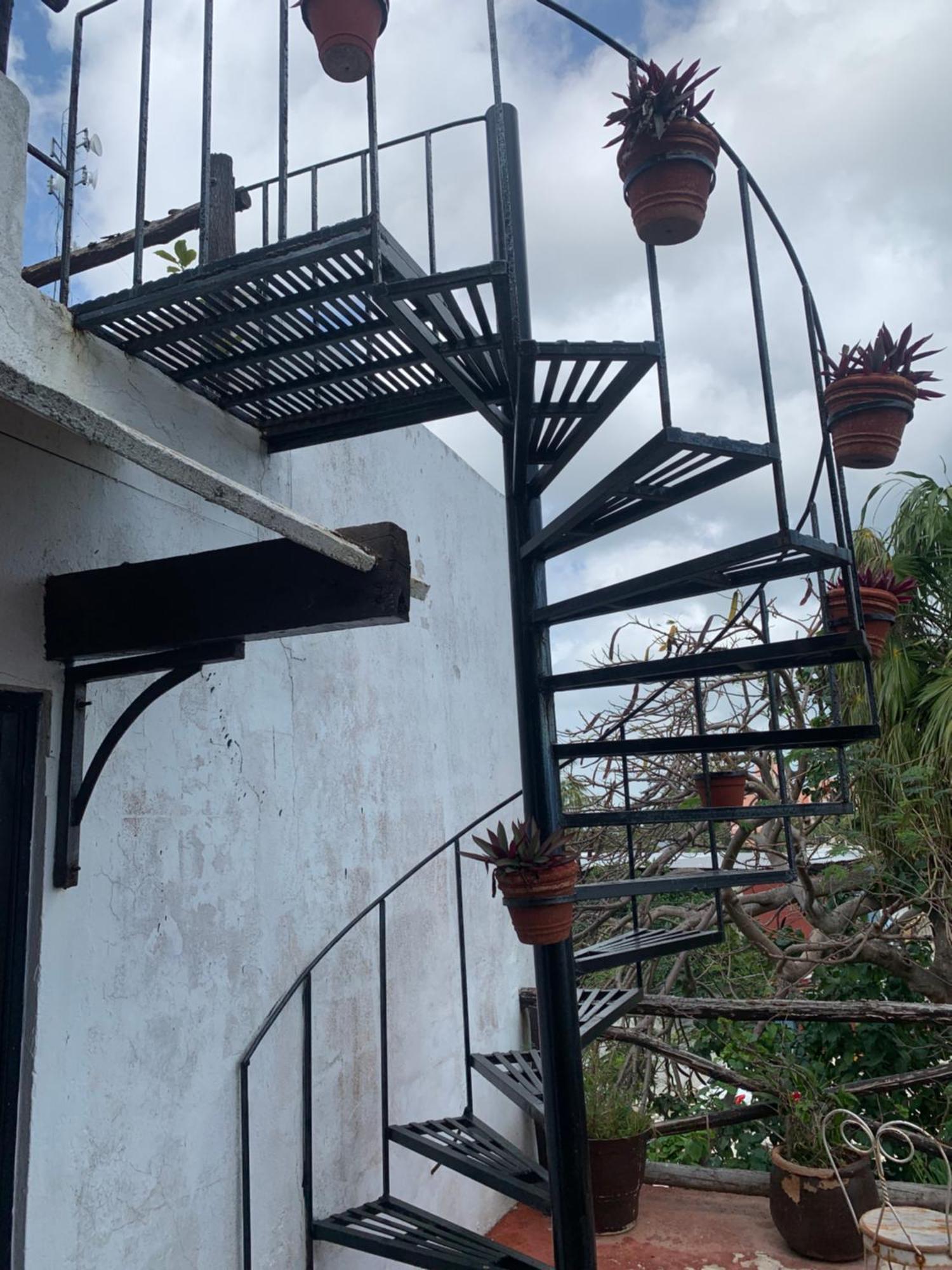 Casa Caribe Канкун Екстериор снимка Spiral staircase