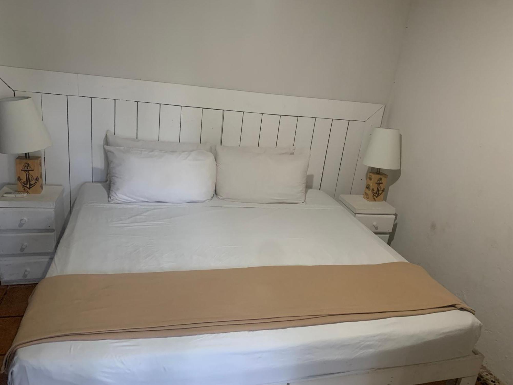 Casa Caribe Канкун Екстериор снимка A bed
